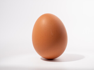 Chicken eggs on a white background. Brown egg on a white background.