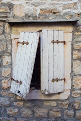 Old window in Budva, Montenegro