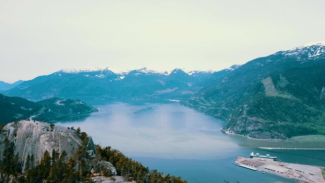 Aerial drone flyover view of the Stawamus Chief peak near Squamish, British Columbia, Canada