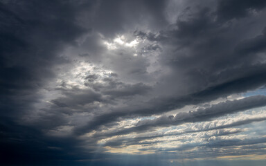 Sky replacement stormy layered clouds
