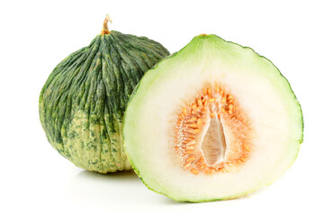 Green melon cut in halves isolated on white