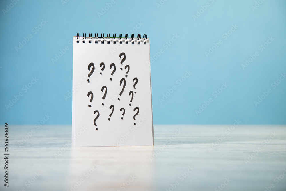 Poster notepad with question marks