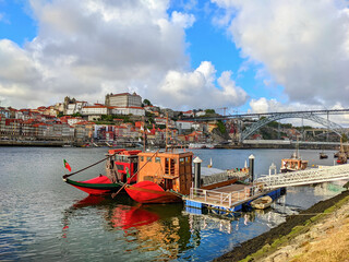 Fototapeta na wymiar Porto wine boats bridge Portugal
