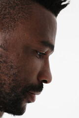 Obraz premium Close-up of serious African American man. Good emotions concept.Vertical mock-up