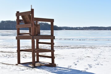 Empty Lifeguard Chair Cold Winter Day at the Beach in Minnesota