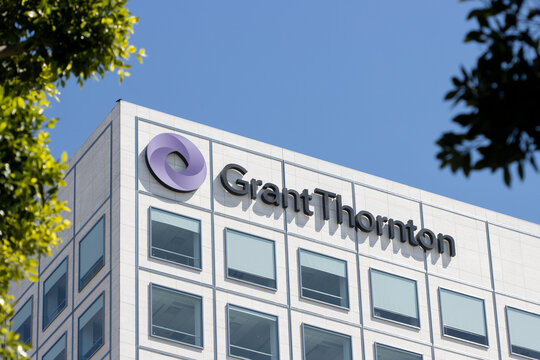 Irvine, CA, USA - May 6, 2022: Grant Thornton logo is seen at the company's office in Irvine, California. Grant Thornton LLP is a global independent accounting and advisory organization.