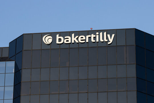 Irvine, CA, USA - May 6, 2022: Exterior view of Baker Tilly's office in Irvine, California. Baker Tilly US, LLP is a public accounting and consulting firm headquartered in Chicago, Illinois.