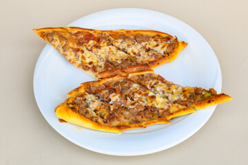 Kiymali pide. Turkish pide with minced meat. Turkish pizza mince pita Pide on white background. Etli ekmek. Kusbasili pide.