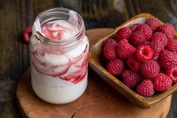 Fresh delicious milk yogurt with raspberry flavor