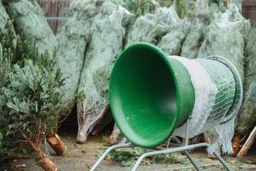 Christmas tree netting tube on farm market
