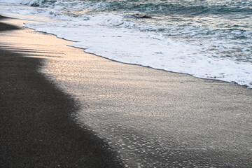 Sea Waves Breaking On A Sandy Beach