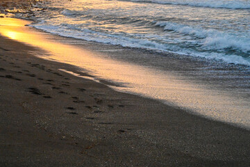 Sea Waves Breaking On A Sandy Beach