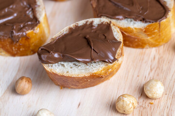 chocolate butter spread on a baguette, close up