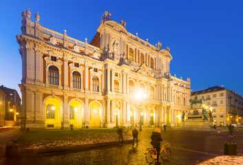 Fototapeta na wymiar Night view of rear facade of Palazzo Carignano in Piazza Carlo Alberto in Turin, Italy