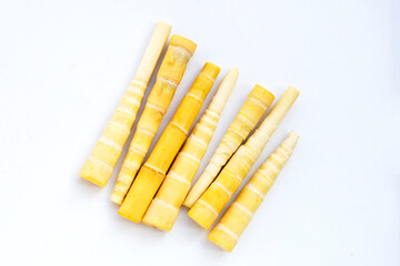 Bamboo shoots on white background.