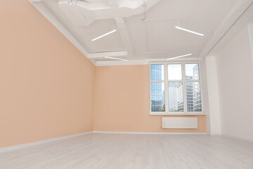 Fototapeta na wymiar New empty office room with clean windows and beige walls