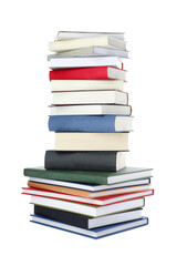 Many different books stacked on white background