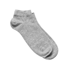 Pair of grey socks on white background, top view