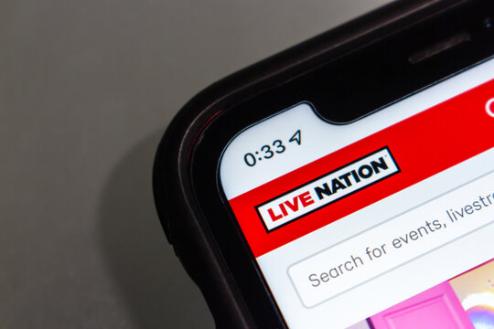 Vancouver, CANADA - Dec 3 2022 : Closeup logo of Live Nation Entertainment, Inc. seen in iPhone. Live Nation is an US global entertainment company following the merger of Live Nation and Ticketmaster.