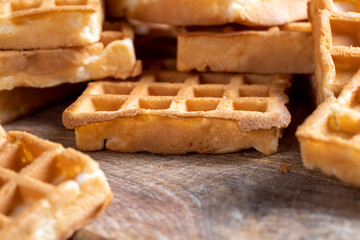 soft sweet waffles on the table, close up