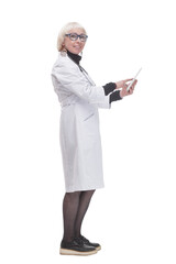 in full growth. female doctor with a digital tablet.