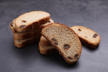 Sweet hard chuck crackers with raisins on grey table