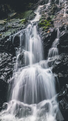 Fototapeta na wymiar a Siu Chik Sha waterfall at TKO, hk