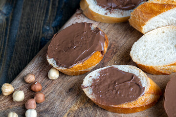 chocolate butter spread on a baguette, close up