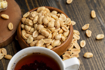 Cheesecake made of dairy products and peanuts in caramel