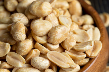 Peeled and roasted peanuts on the table