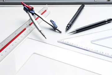 Architecture tools on the drawing board.