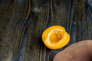 Orange-colored ripe apricot cut into pieces