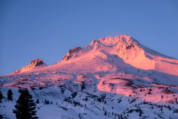 alpenglow on snowy mountain