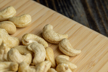 Fresh peeled cashew nuts on the table