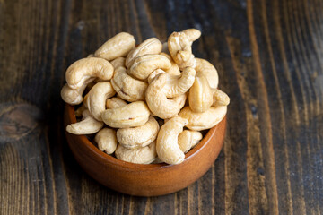 Fresh peeled cashew nuts on the table