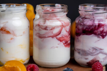 Fototapeta na wymiar Fresh delicious yogurt made from milk with berry flavor
