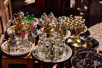 Traditional metal and glass dishes in the Moroccan style. Fez, Morocco