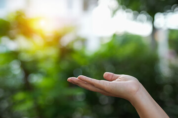 Technology, hand holding with environment Icons over the Network connection on green background.