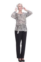 Fototapeta premium attractive young woman listening to music through headphones .