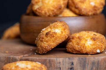 Delicious cookies with coconut on the table