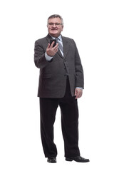 Obraz premium in full growth.business man with a smartphone.