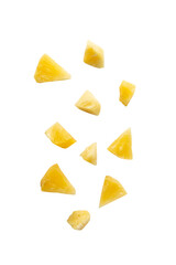 Falling pineapple slices isolated on white background with clipping path.