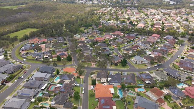 Aerial drone view of Voyager Point in South West Sydney, NSW Australia heading toward the footbridge on Georges River 