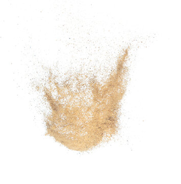 Sand flying explosion, Golden sand wave explode. Abstract sands cloud fly. Yellow colored sand splash throwing in Air. White background Isolated high speed shutter, throwing freeze stop motion