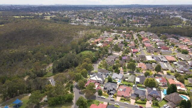 Aerial drone view of Voyager Point in South West Sydney, NSW Australia heading toward the footbridge on Georges River 