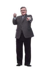 in full growth.happy business man with keys in hand.