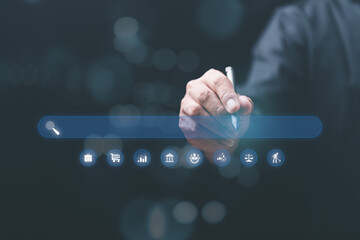 A young man searches for information that interests him through online websites, keyword search...