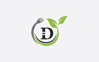 Green leaf food logo with spoon and healthy logo design image spoon fork and leaf