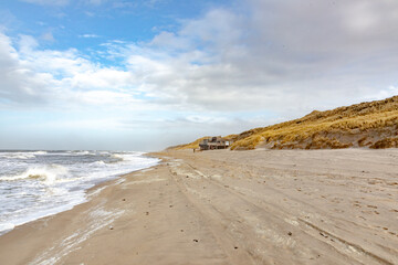 scenic landscape in Sylt with ocean, dune and empty beach