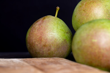 Whole ripe green pears, close up